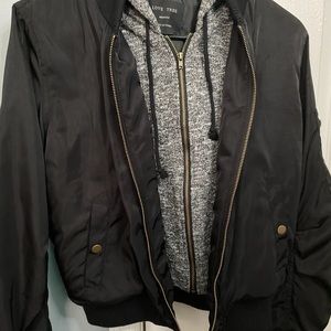 Black 2 layer jacket with hood.